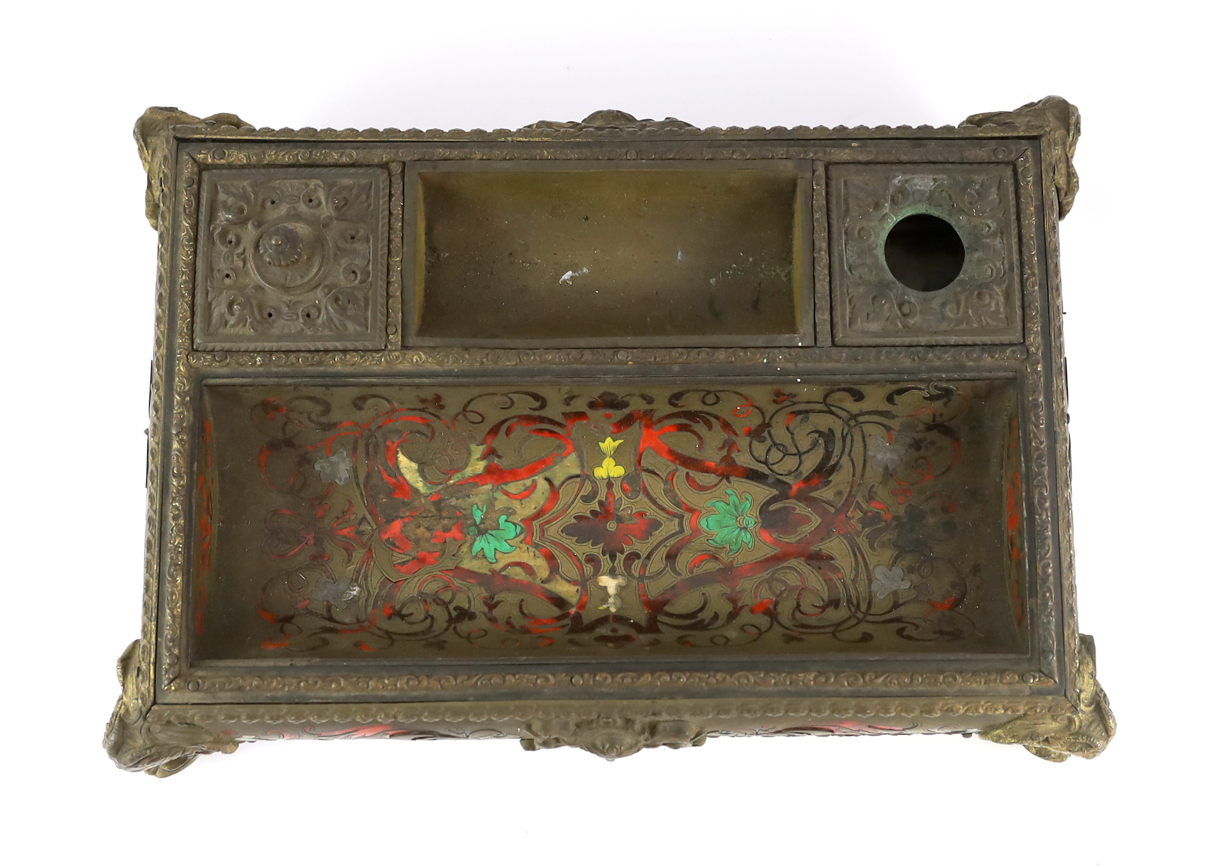 A 19th century French scarlet Boulle work desk stand with ormolu mounts, 36cm wide